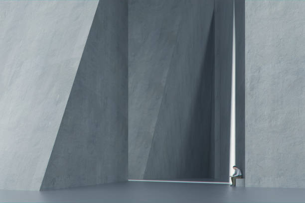 Lonely man in futuristic concrete urban environment.