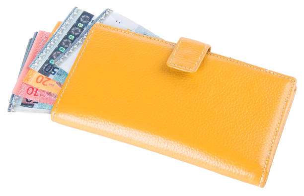 istock woman wallet with money on background 914733322