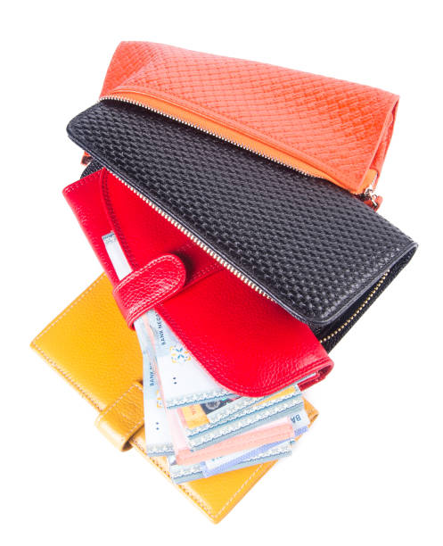 istock woman wallet with money on background 914733346
