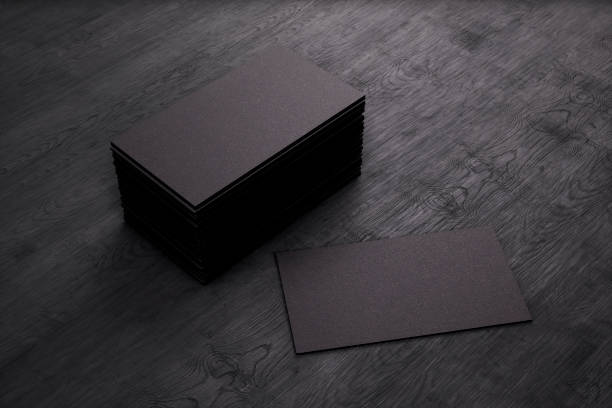 Blank template black Business Cards on black wooden background. 3D rendering. Blank template black Business Cards on black wooden background. 3D rendering visit card stock pictures, royalty-free photos & images