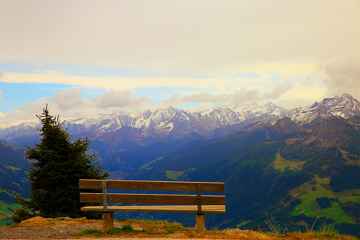 have a seat and enjoy the view! landscape above Zillertal valley, Tyrol Snowcapped alps, Austria