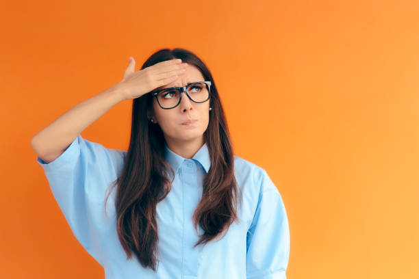 istock Forgetful Brainy Girl Trying to Remember Her Clever Idea 914739016
