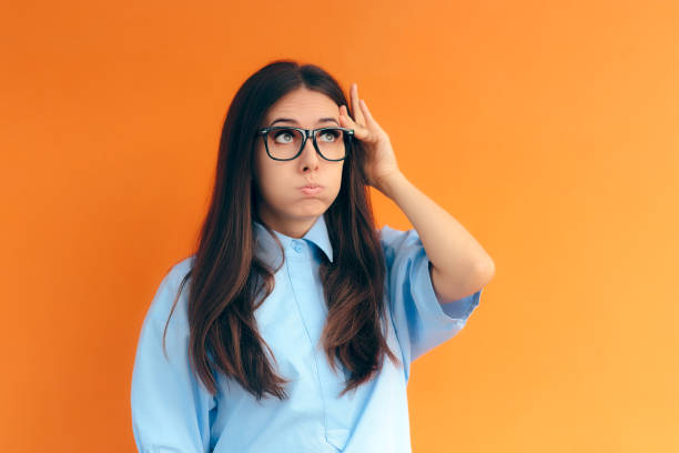 istock Forgetful Brainy Girl Trying to Remember Her Clever Idea 914739026