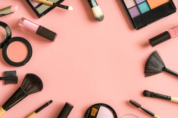 istock Set of make up brushes and cosmetics on pink background 914741860