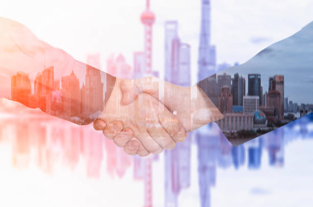 Deal or agreement business concept, handshake double exposure