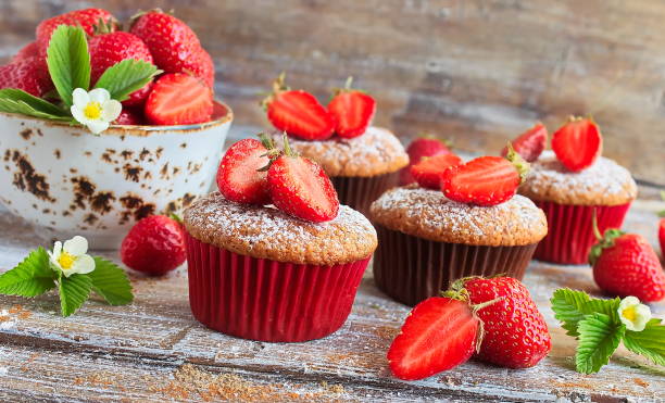 istock Delicious homemade muffins with fresh strawberries 914746410