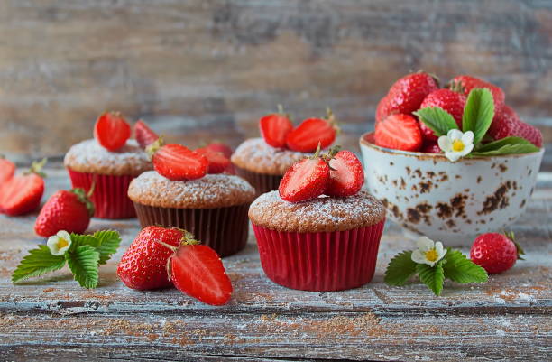 istock Delicious homemade muffins with fresh strawberries 914746442