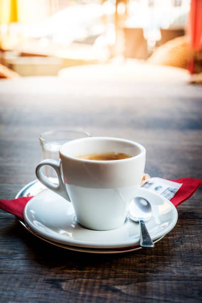 istock Hot coffee on wood table 914747674
