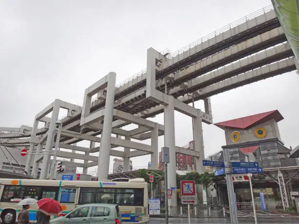 Chiba city, monorail train, koban police station, elevated train, tall ramp, day, Japan