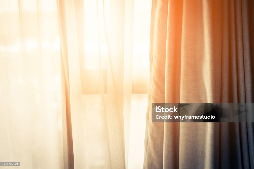 Brown Curtain with Beautiful Sun Light and Shadow Curtain Stock Photo