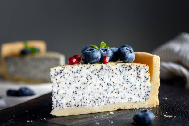 Slice of cheesecake with poppy seeds