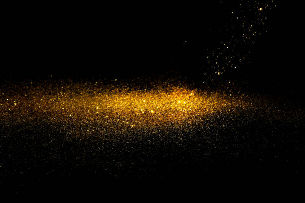 istock Sprinkle glitter gold dust in the dark textured abstract background elegant for Merry christmas and Happy new year 914751126
