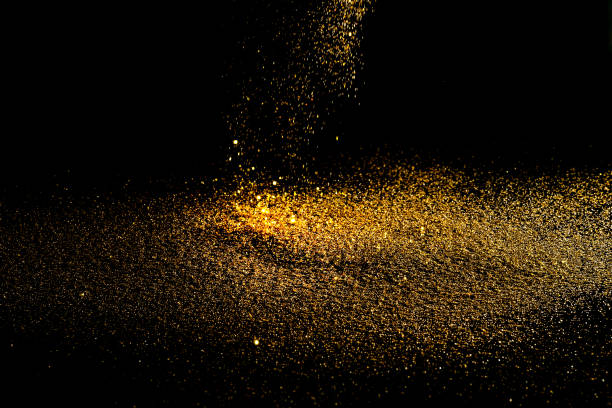 istock Sprinkle glitter gold dust in the dark textured abstract background elegant for Merry christmas and Happy new year 914751158