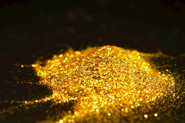 istock Sprinkle glitter gold dust in the dark textured abstract background elegant for Merry christmas and Happy new year 914751168