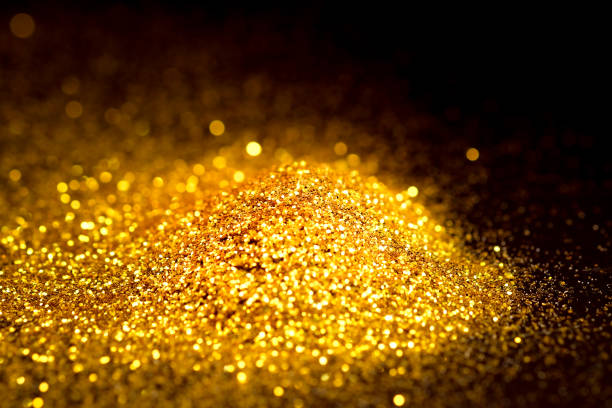 istock Sprinkle glitter gold dust in the dark textured abstract background elegant for Merry christmas and Happy new year 914751188