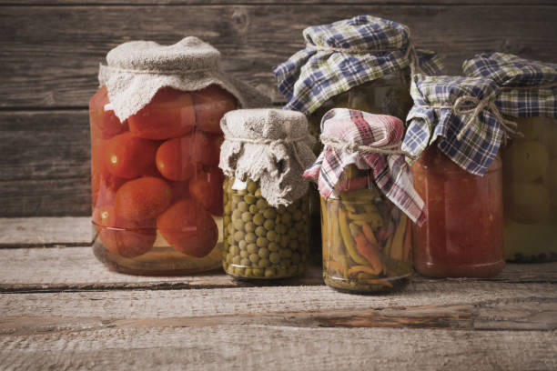 istock preserved vegetables in jar on old wooden background 914754876