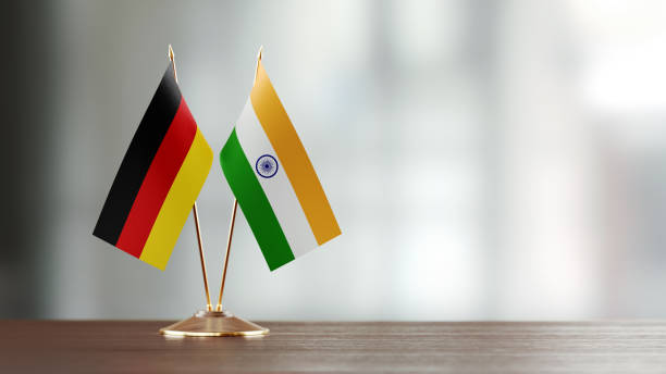 istock German And Indian Flag Pair On A Desk Over Defocused Background 914755422