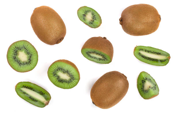 istock Kiwi fruit with slices isolated on white background, close-up. Top view. Flat lay pattern 914764664