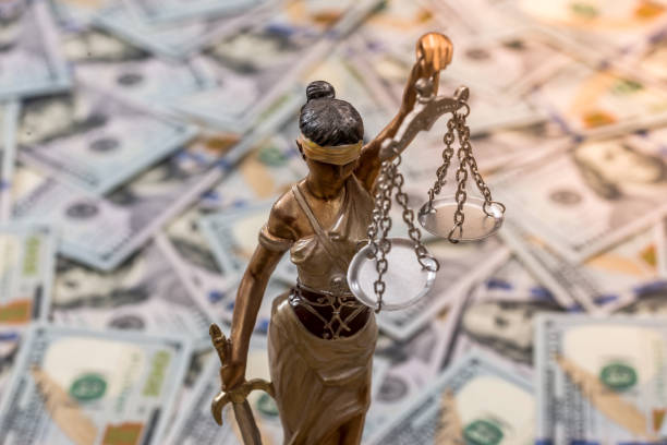istock Themis statue standing against the background of dollars 914764880