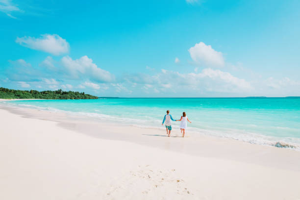 istock happy loving couple enjoy tropical beach 914771230