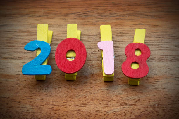 istock New year concept : Close up white wooden alphabet 2018 914776648