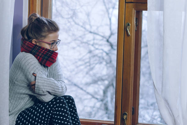 istock Girl in a scarf and glasses 914776768