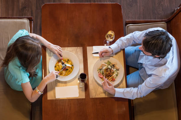 istock A couple enjoying a meal in a restaurant 914776860