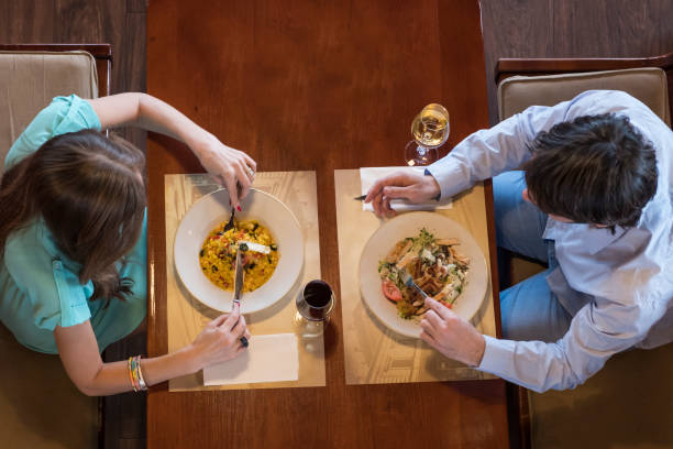 istock Celebration. Romantic Couple In Love Cheering, Having Dinner. Restaurant 914779314