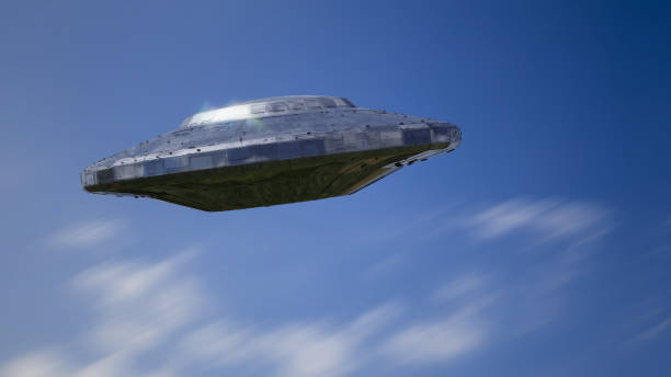 istock UFO, science fiction scene with alien spaceship, visitors in flying saucer  (3d space rendering) 914782780