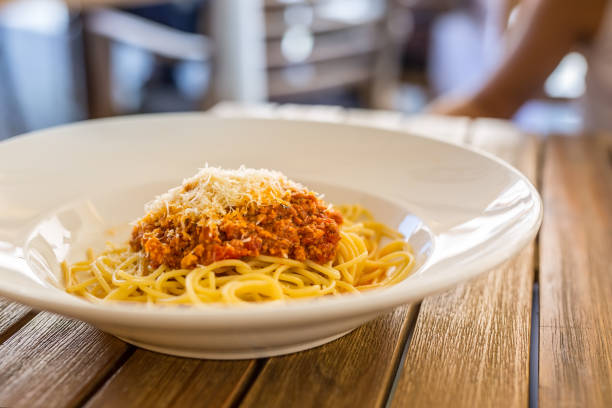 istock Spaghetti bolognese. Plate with spaghetti on table in restaurant 914785138