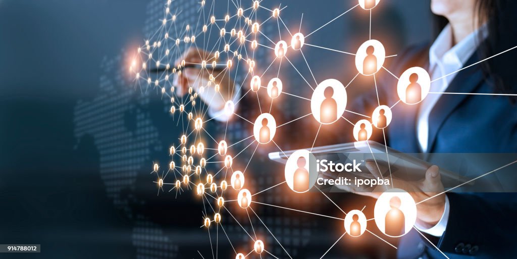 Business woman drawing global structure networking and data exchanges customer connection on dark background Connection Stock Photo