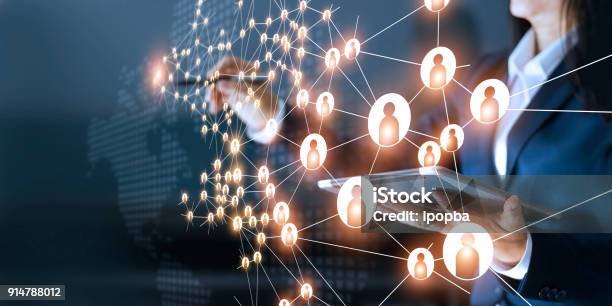 Business Woman Drawing Global Structure Networking And Data Exchanges Customer Connection On Dark Background Stock Photo - Download Image Now
