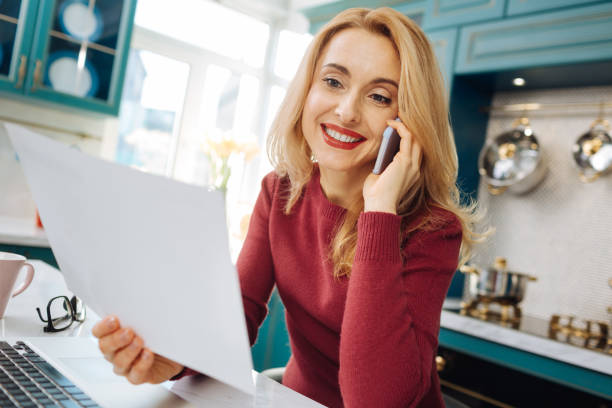 istock Exuberant freelancer talking on the phone 914788462
