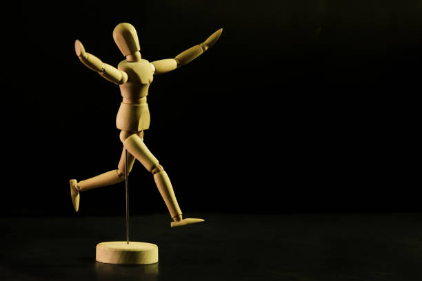 The simulator mimics the people who are running to the finish line. The winner and succeed in the race. Have a black background, success and winning concept.