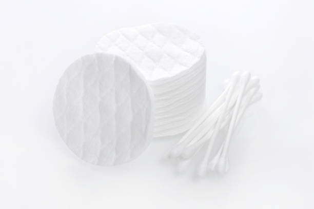 istock hygiene products, cotton pads and buds on white background 914796770