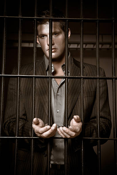istock Businessman in jail 91479981