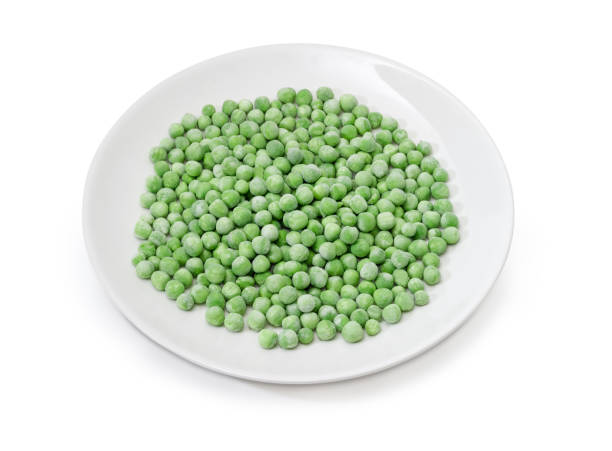 istock Frozen green peas on dish on a white background 914801864