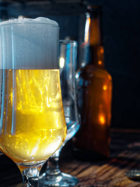 istock Beer on wooden bar counter 914801960