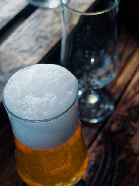 istock Beer on wooden bar counter 914802014