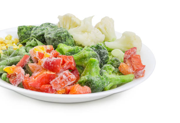 istock Various frozen vegetables on the white dish closeup 914803306
