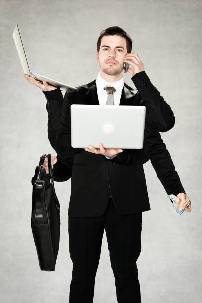 uomo d'affari è un polpo - multi tasking efficiency financial advisor business foto e immagini stock