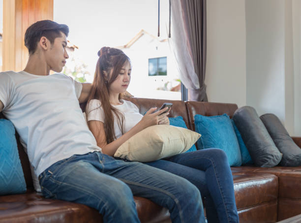 istock Couple Flirting In The Living Room 914807096