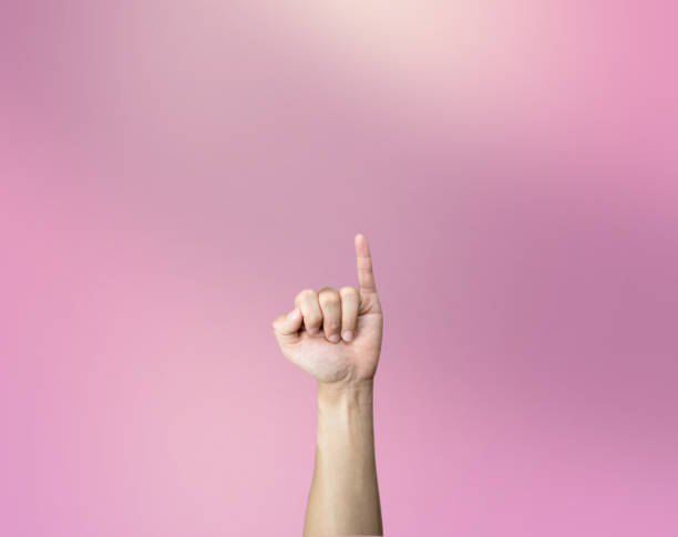 istock Pinky swear hand gesture on pink background 914807186