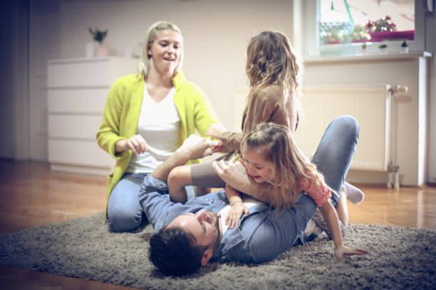 istock Young family at home. 914809998