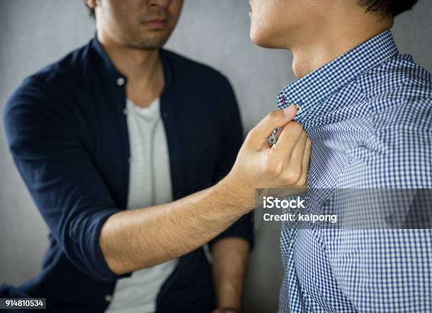 Man Grab Other By The Collar Having Argument Stock Photo - Download Image Now - Violence, Fighting, Men