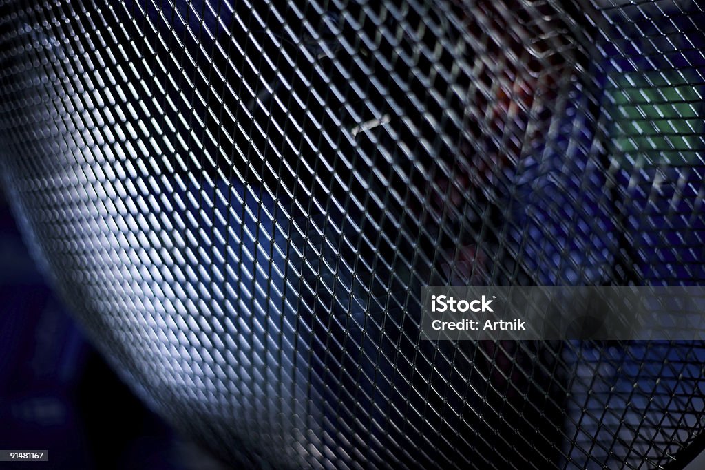 Protective lattice of the fan Dark blue background from a protective lattice of the fan Abstract Stock Photo