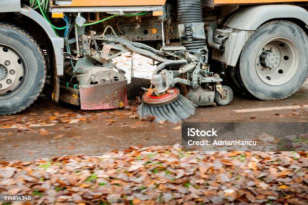 Truck Sweeper On Urban City Street Cleaning Leaves Stock Photo - Download Image Now - Road, Semi-Truck, Street