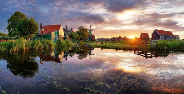 istock Netherlands windmills at sunset, landscape. 914817768