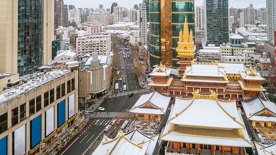 aerial view of downtown Shanghai near Jing An Temple and Nanjin Road after an unusual snowfall in the morning