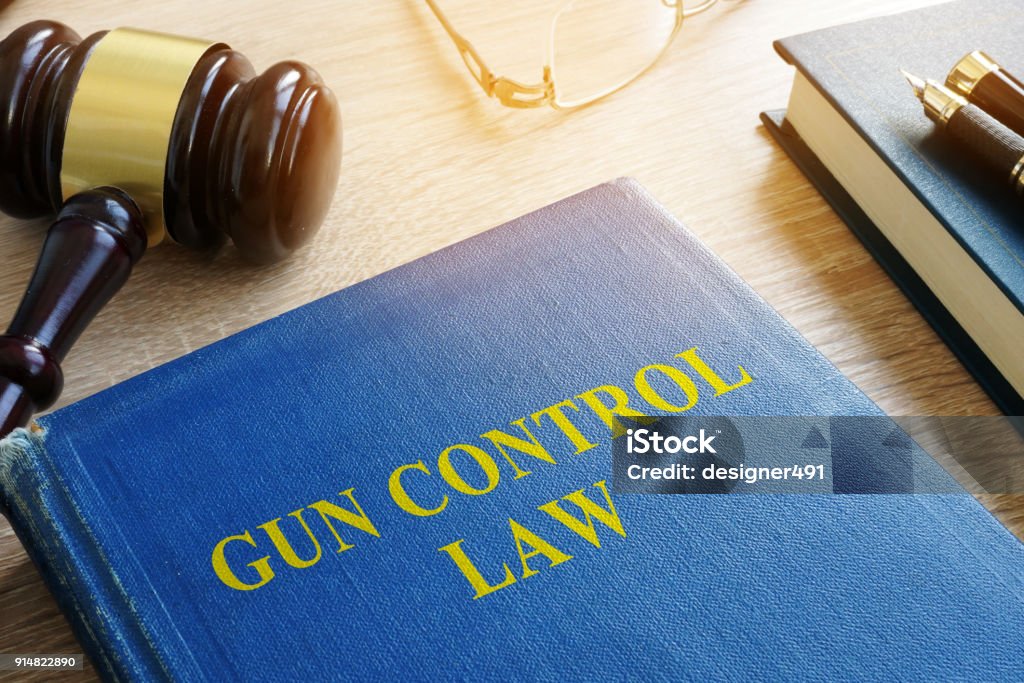 Gun control law in a court. Gun Control Stock Photo
